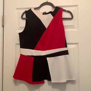 Red, black, and white peplum top